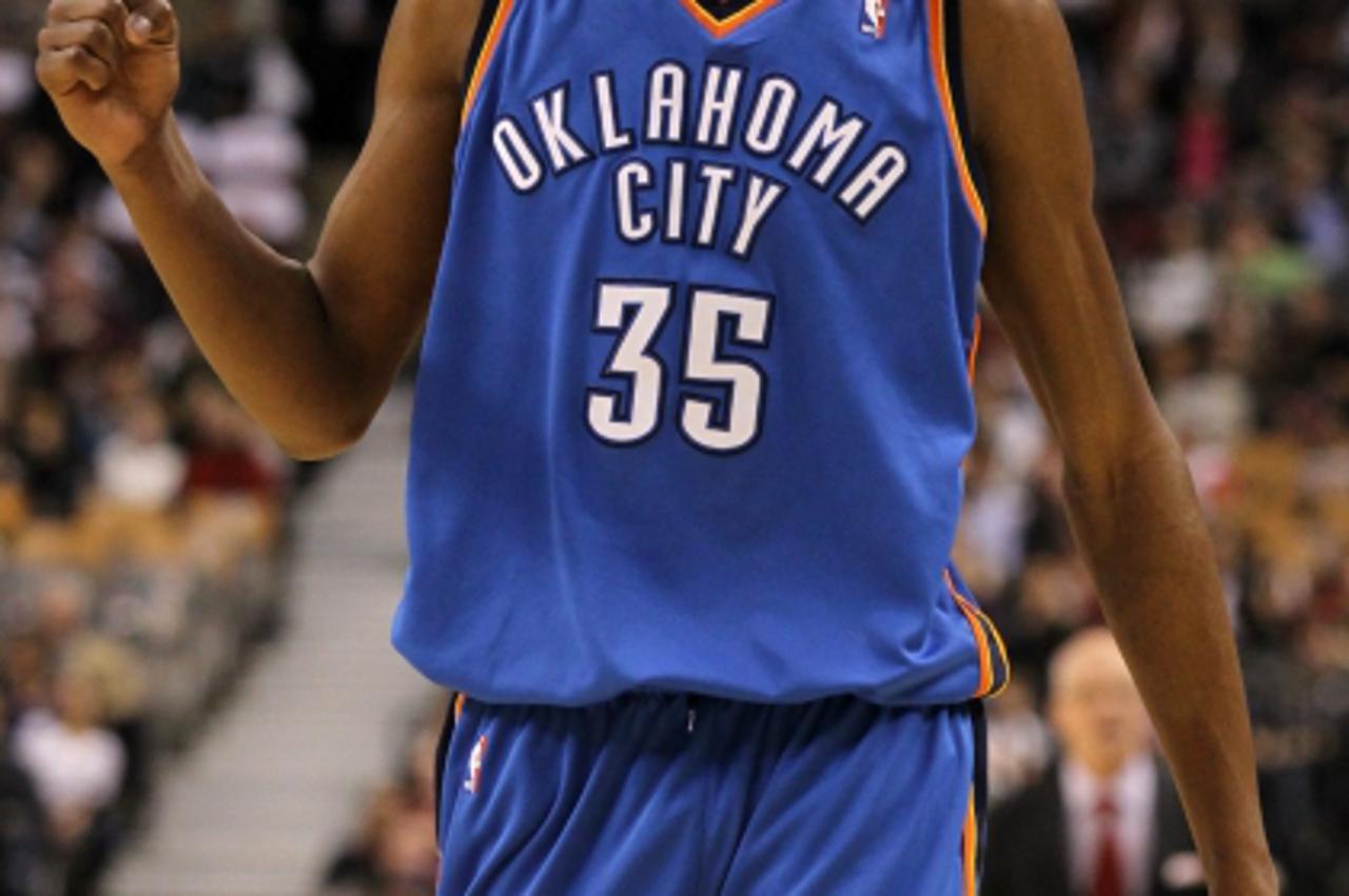 'Oklahoma City Thunder's Kevin Durant reacts after drawing a foul during first-half NBA basketball game action in Toronto, Friday, March 19, 2010. (AP Photo/The Canadian Press,Darren Calabrese) Photo