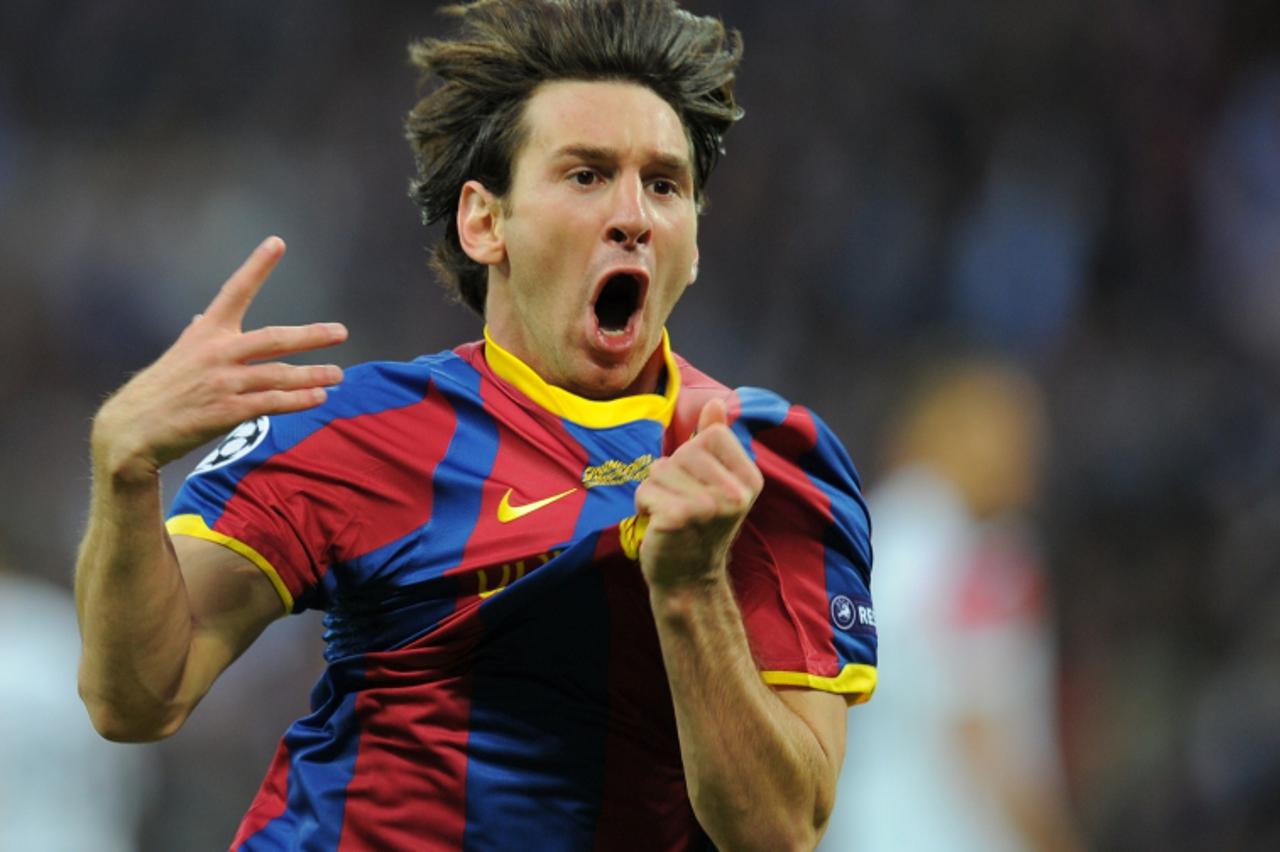 'FBL-SPORTS-YEAR-2011   Barcelona\'s Argentinian forward Lionel Messi celebrates after scoring a goal during the UEFA Champions League final football match FC Barcelona vs. Manchester United, on May 2