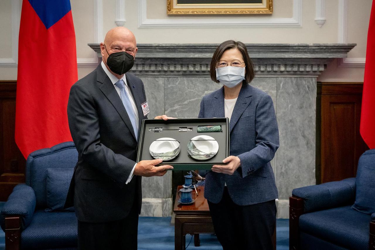 Taiwan's President Tsai Ing-wen and James O. Ellis, a visiting fellow at Hoover and retired U.S. Navy admiral pose for a photo at the Presidential building, in Taipei