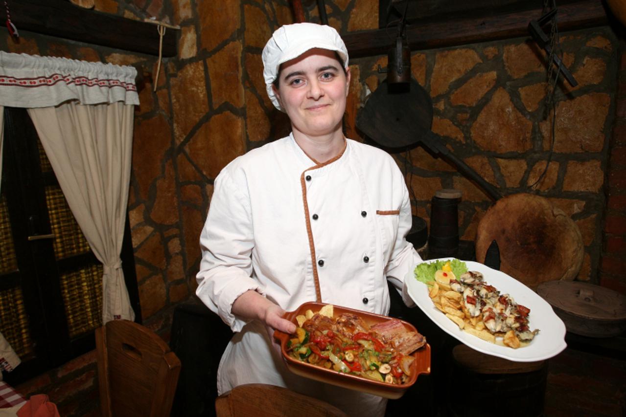 '25.01.2012., Zagreb - Konoba Didov san. Zablji krakovi s prsutom i janjetina i teletina. Kuharica Karolina Matasic. Photo: Igor Kralj/PIXSELL'