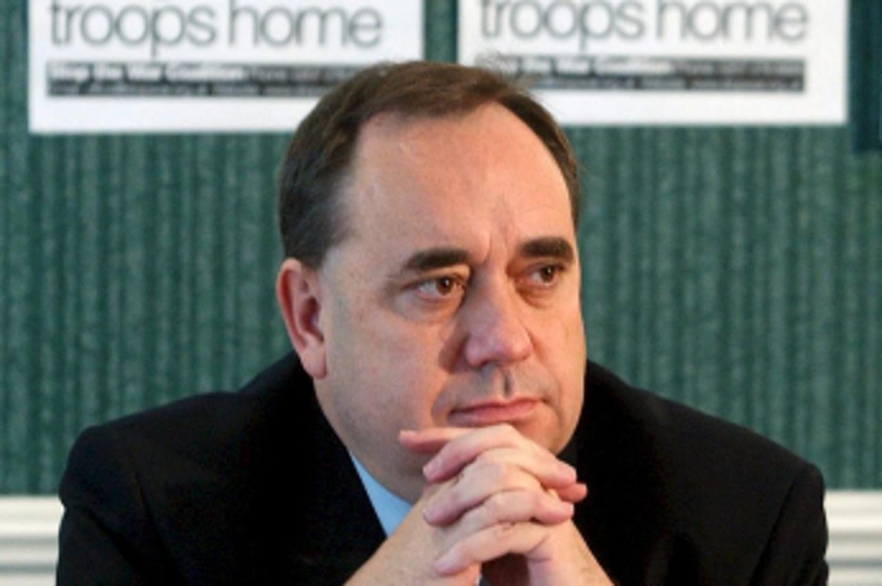 'epa000457553 Leader of the Scottish Nationalist Party Alex Salmond looks on during a Stop the War Coalition media briefing held in London, Wednesday 15 June 2005, at which they outlined details of a 