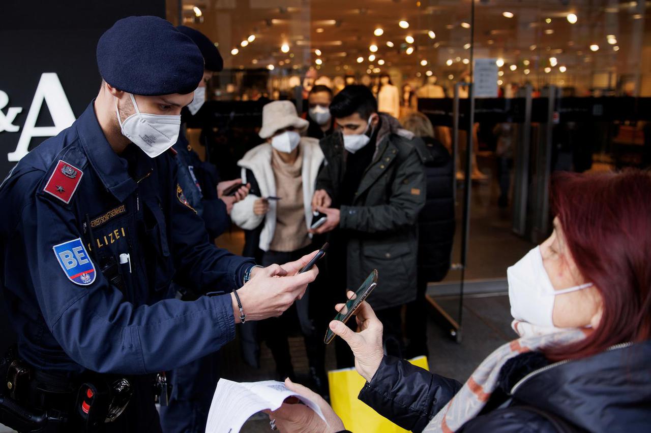FILE PHOTO: Police patrol streets to check people's vaccination status in Vienna