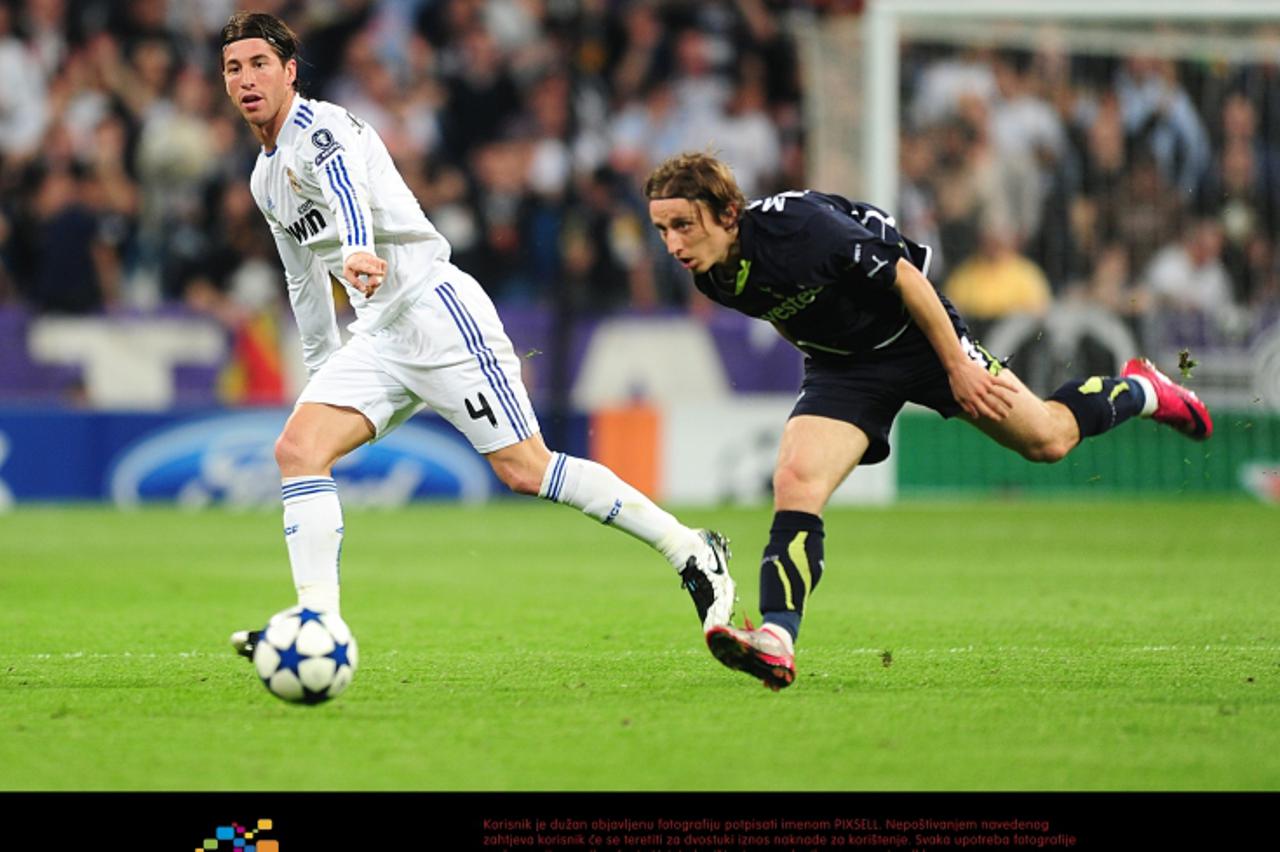 'Real Madrid\'s Sergio Ramos (left) and Tottenham Hotspur\'s Luka Modric (right) in action Photo: Press Association/Pixsell'
