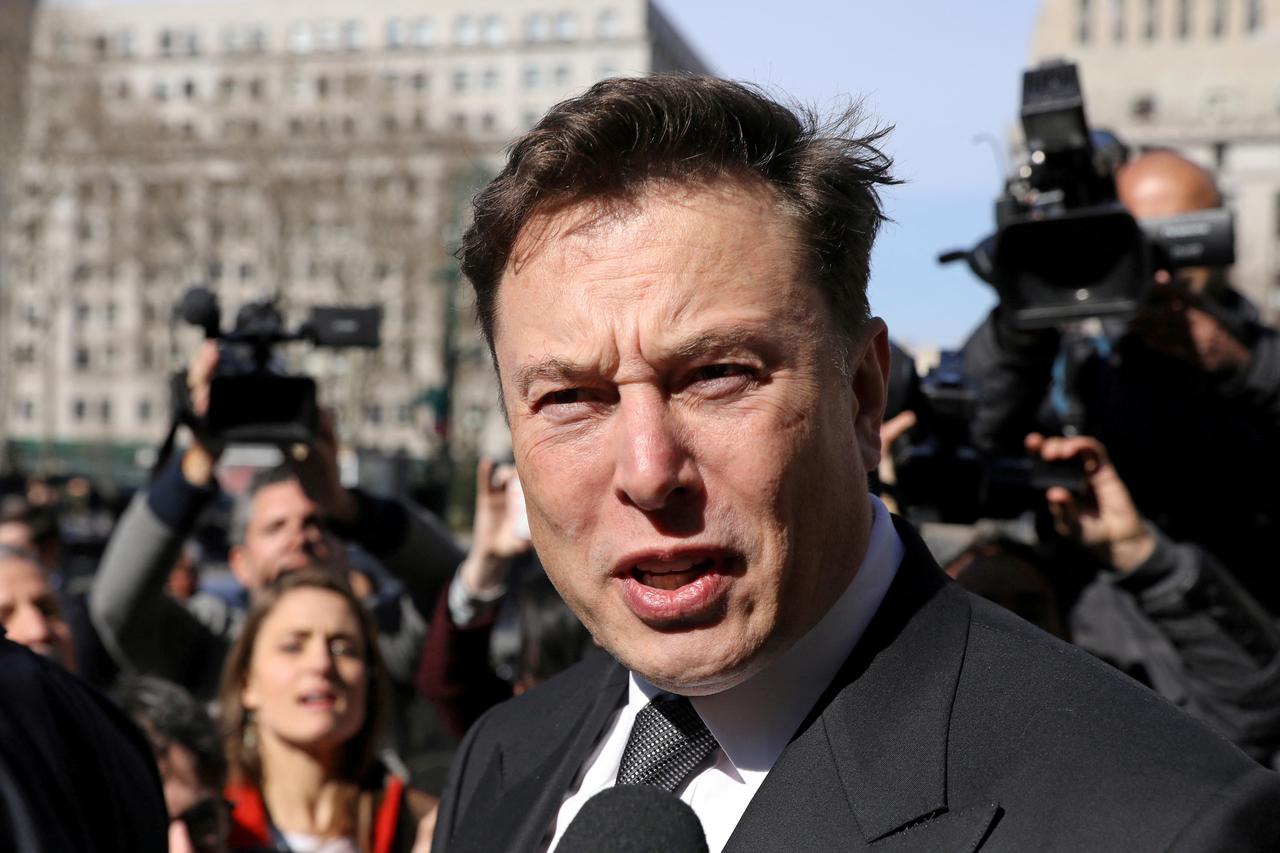 FILE PHOTO: Tesla CEO Elon Musk leaves Manhattan federal court after a hearing on his fraud settlement with the SEC in New York