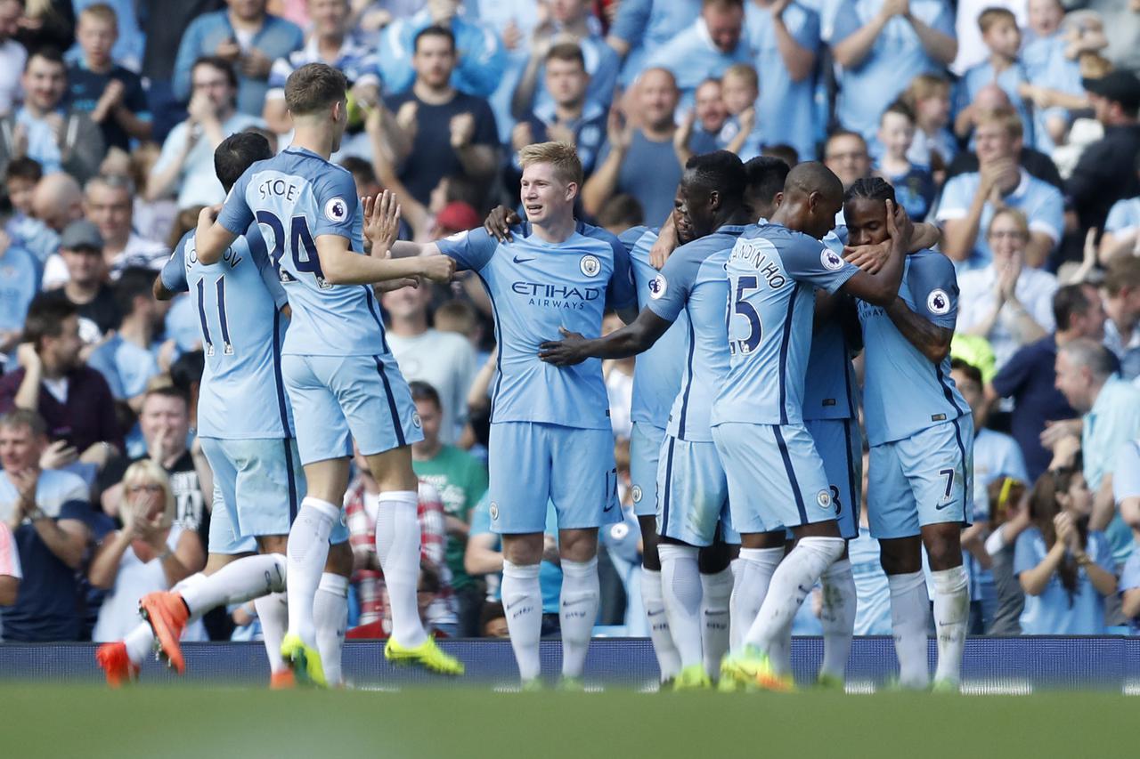 Football Soccer Britain - Manchester City v AFC Bournemouth - Premier League - Etihad Stadium - 17/9/16 Manchester City's Ilkay Gundogan celebrates scoring their fourth goal with team mates Action Images via Reuters / Carl Recine Livepic EDITORIAL USE ONL