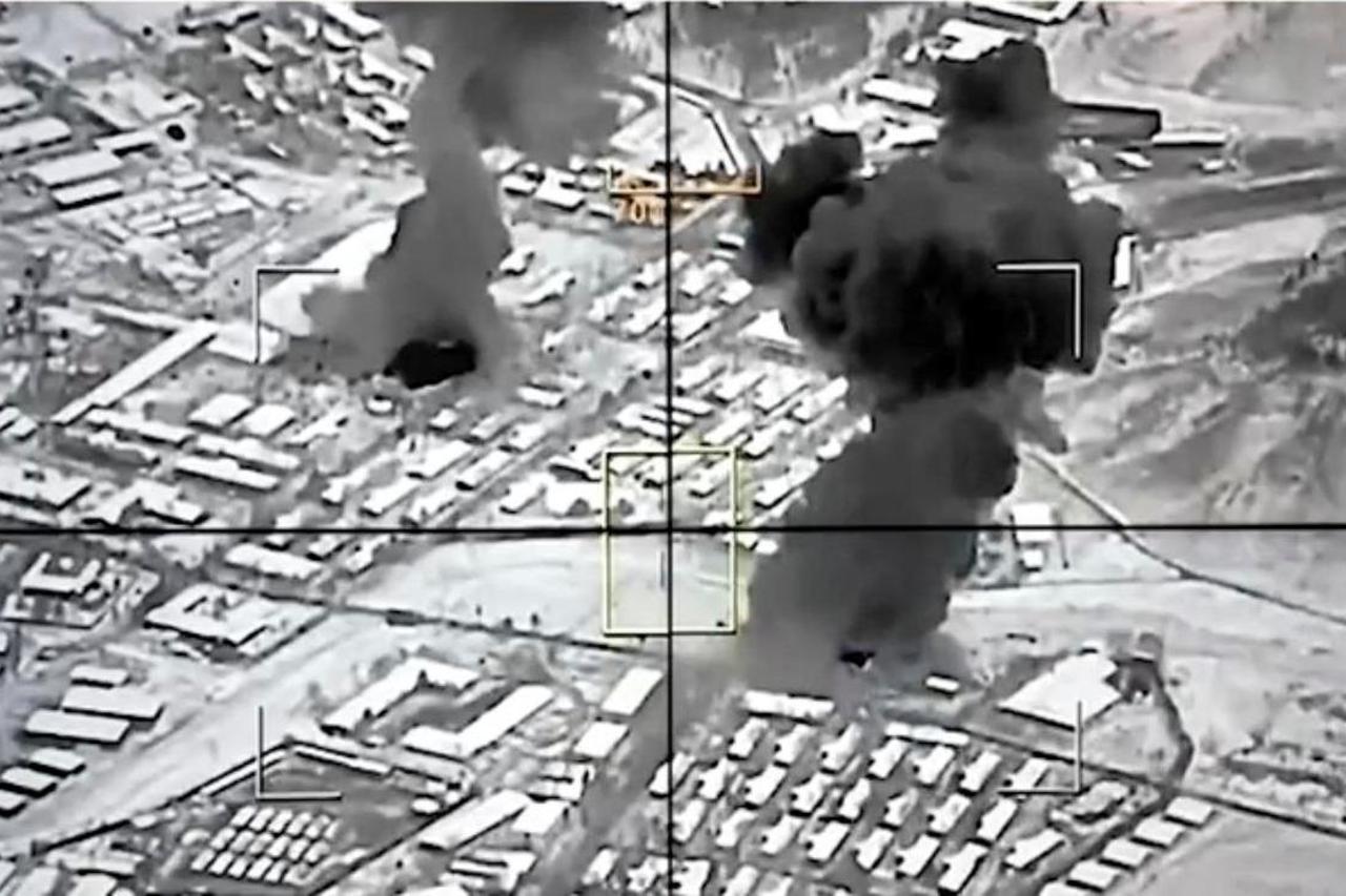 Smoke rises following what Pakistani and Taliban officials say are Pakistani strikes, in Kabul