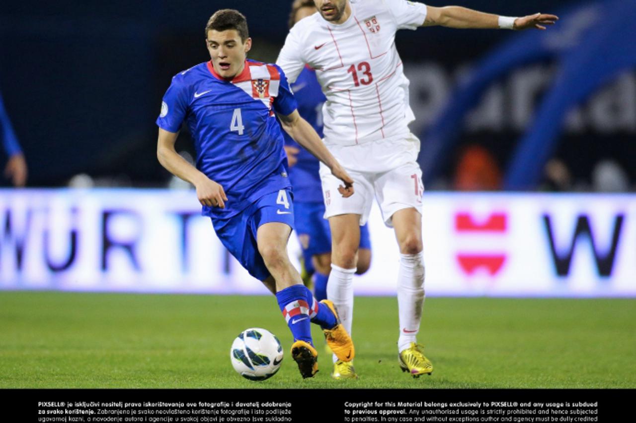 '22.03.2013., stadion u Maksimiru, Zagreb - Kvalifikacijska nogometna utakmica za Svjetsko prvenstvo 2014. u Brazilu, skupina A, Hrvatska - Srbija. Mateo Kovacic, Ivan Radovanovic.  Photo: Goran Stanz
