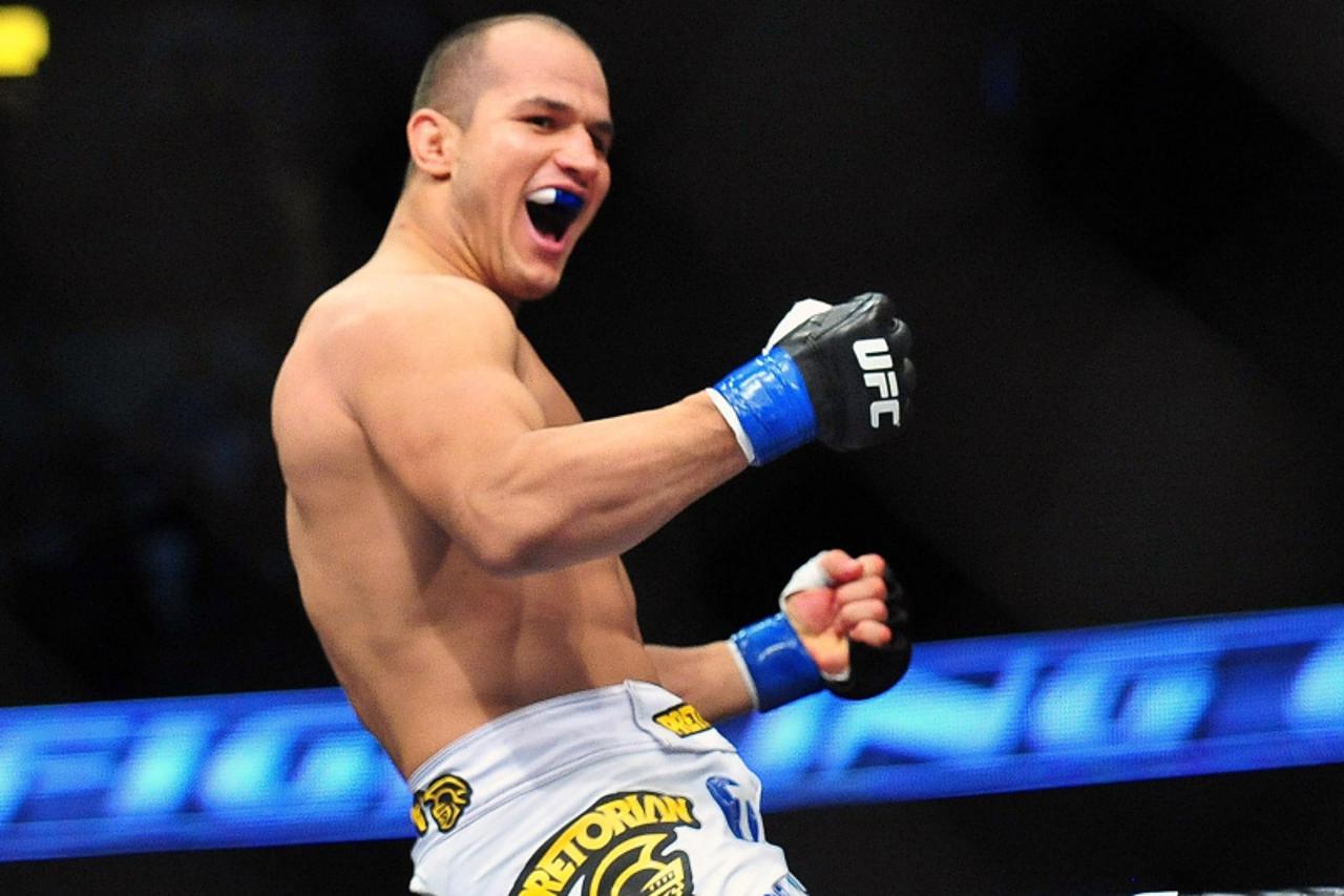 'Nov 12, 2011; Anaheim, CA, USA; Junior Dos Santos reacts after defeating Cain Velasquez (not pictured) after the UFC championship bout at the Honda Center. Dos Santos won by knockout. Mandatory Credi