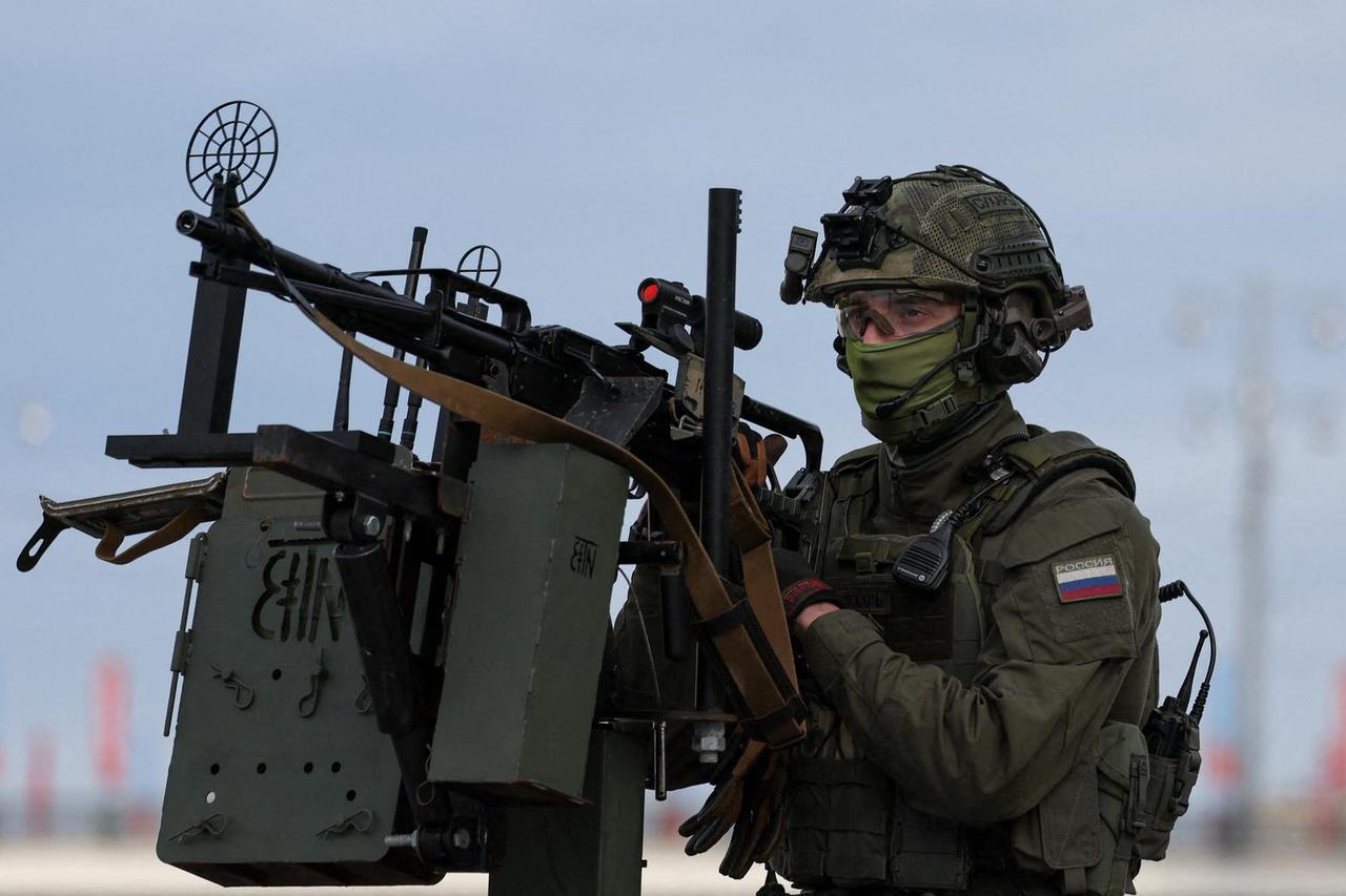 Security personnel patrol an area before a military parade in Moscow