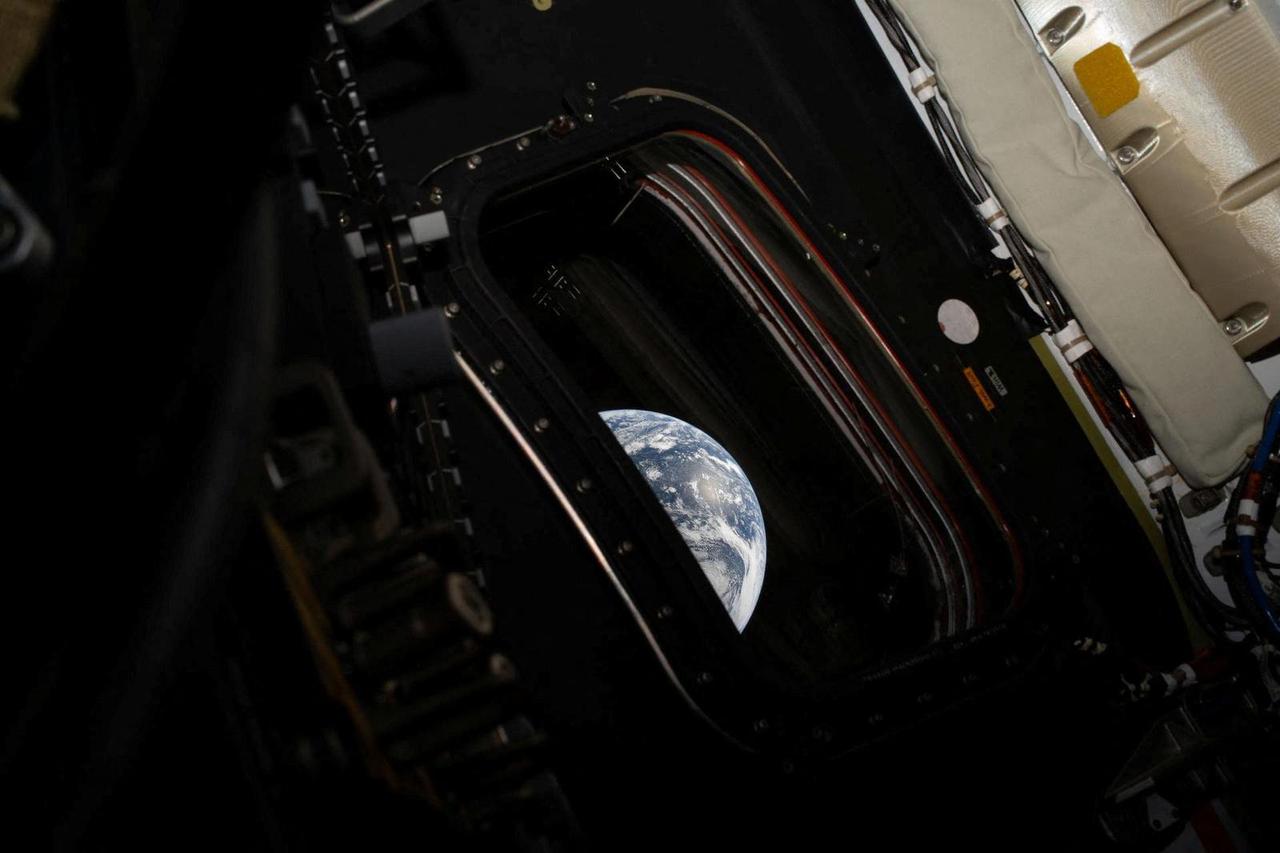 A view of Earth taken by NASA astronaut and Artemis II commander Reid Wiseman from one of the Orion spacecraft's four main windows