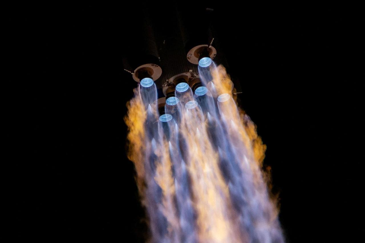 FILE PHOTO: Long March 2F rocket carrying the Shenzhou-21 spacecraft blasts off from launchpad at Jiuquan Satellite Launch Center