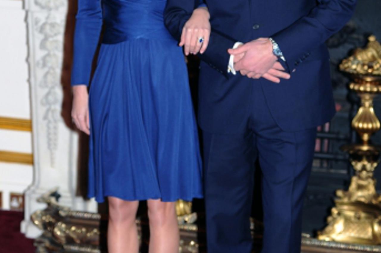 'Prince William and Kate Middleton pose for photographs in the State Apartments of St James Palace on November 16, 2010 in London. After much speculation, Clarence House today announced the engagement