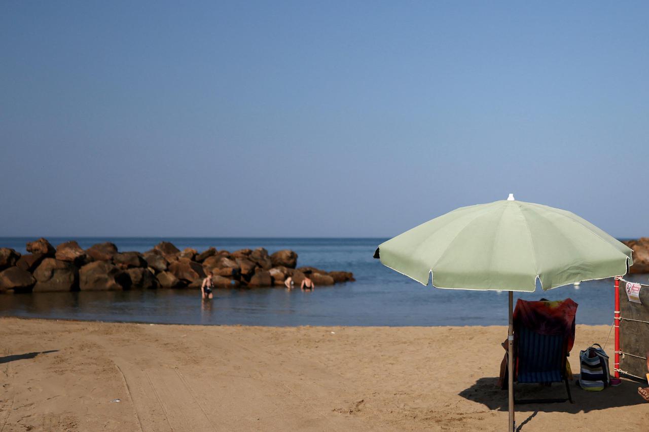 Italy's coastline stages culture clash between equipped lidos and public beaches