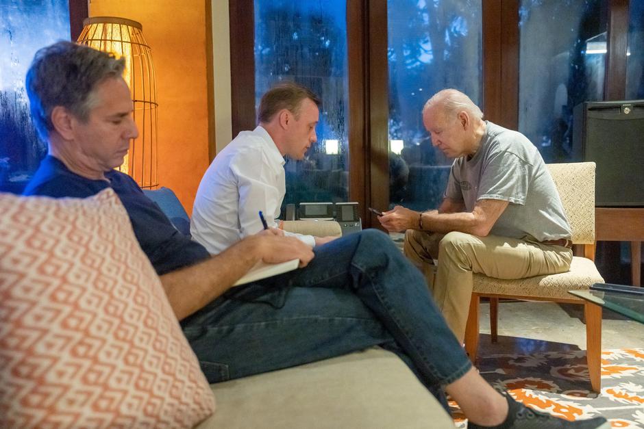 U.S. President Biden speaks with Poland's President Duda behind the scenes at the G20 summit
