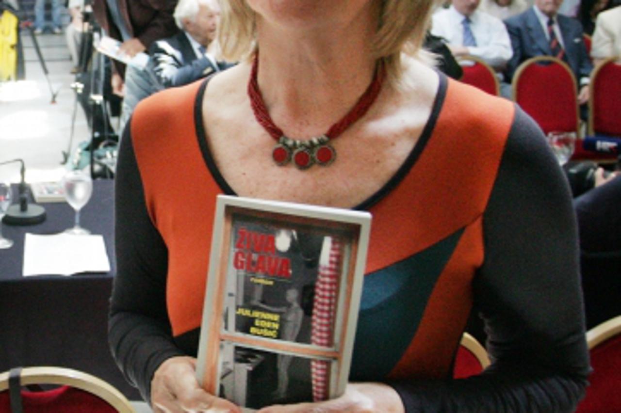 '09.05.2012., Zagreb - U predvorju Muzeja Mimara odrzano je predstavljanje romana Ziva glava autorice Julienne Eden Busic. Tema su zene silovane u Vukovaru za vrijeme srpske okupacije.  Photo: Borna F