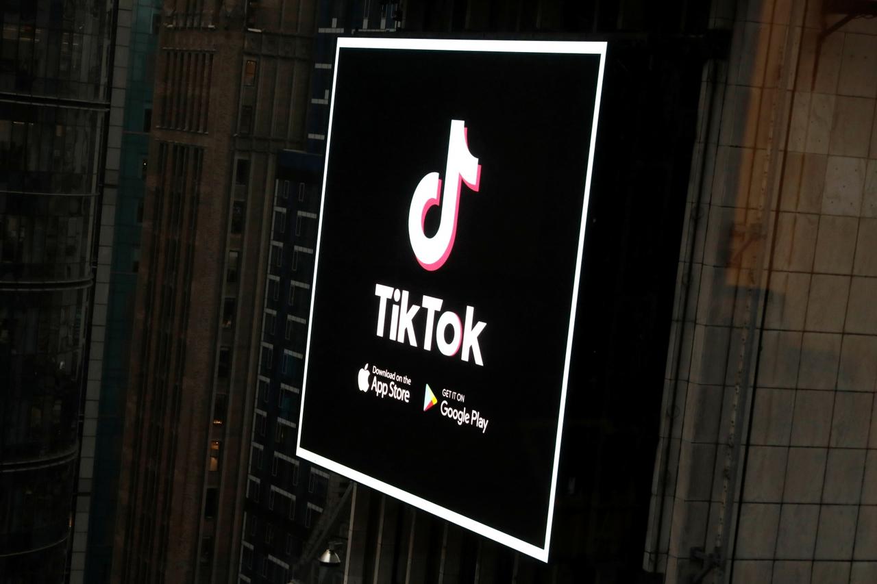 The TikTok logo is seen on a screen over Times Square in New York City