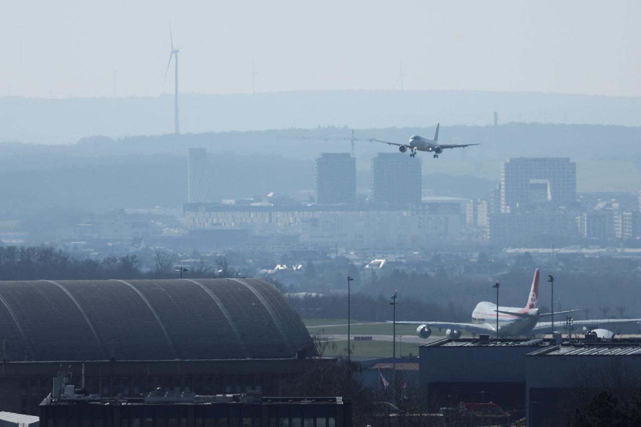 An aircraft carrying passengers evacuated from the Middle East arrives from Muscat at the Luxembourg Airport