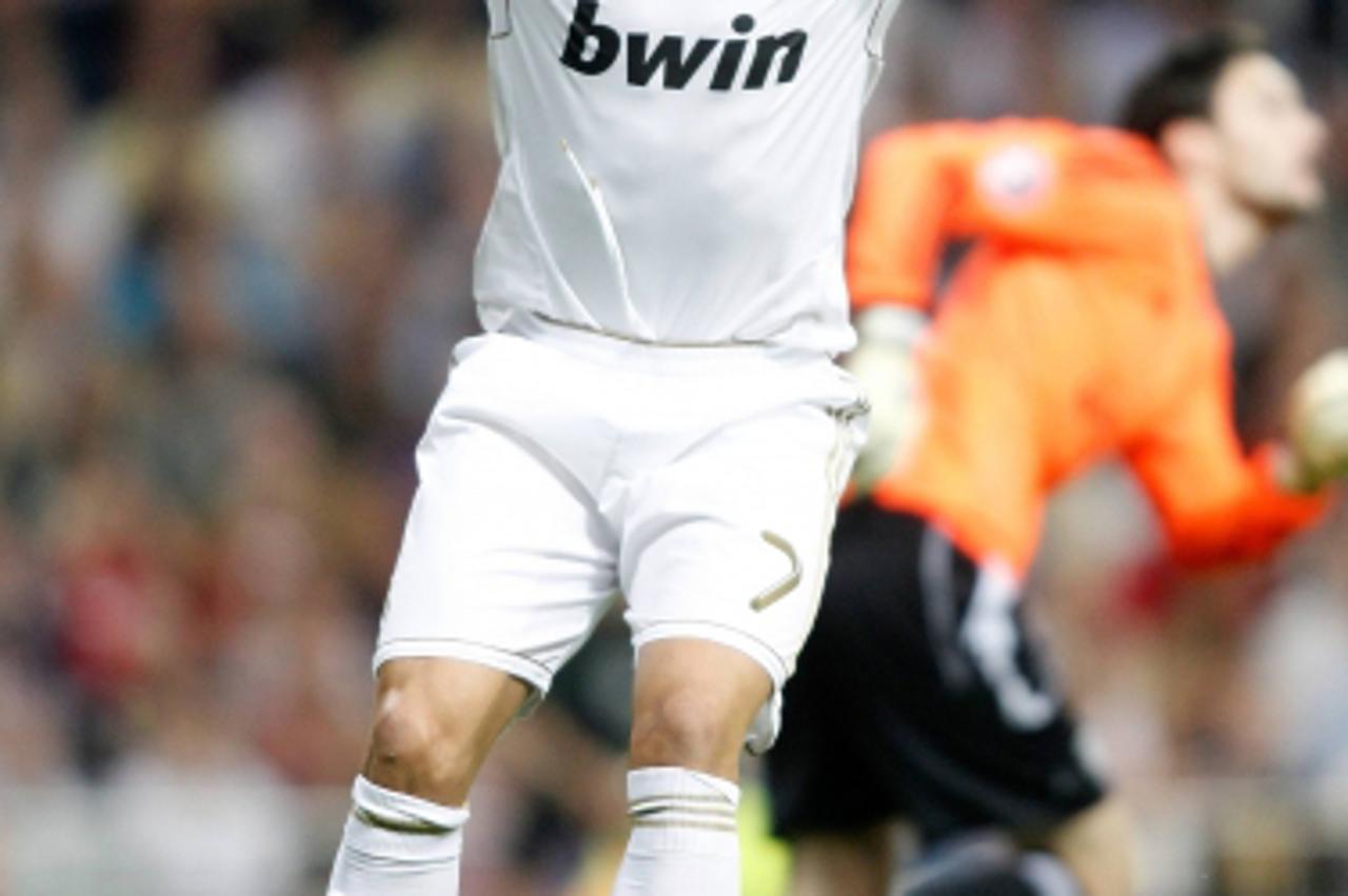 'Real Madrid\'s Cristiano Ronaldo dejected during UEFA Champions League match. October 18, 2011. // during the UEFA CL, group D, Real Madrid (ESP) vs Olympique Lyon (FRA) on 2011/10/18, at Bernabeu-St