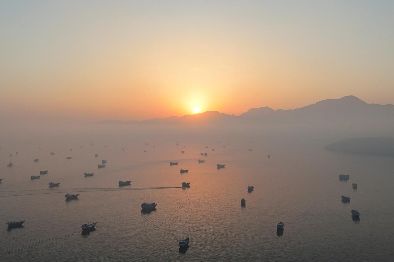 FILE PHOTO: A drone view shows vessels in the Strait of Hormuz, as seen from Musandam