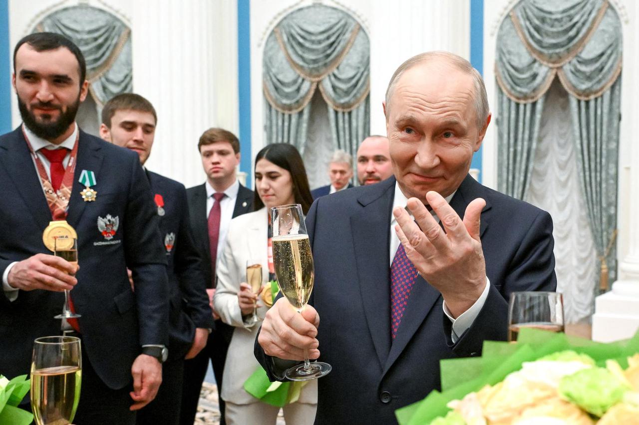 Russian President Vladimir Putin meets with athletes and representatives of the Russian Boxing Federation in Moscow
