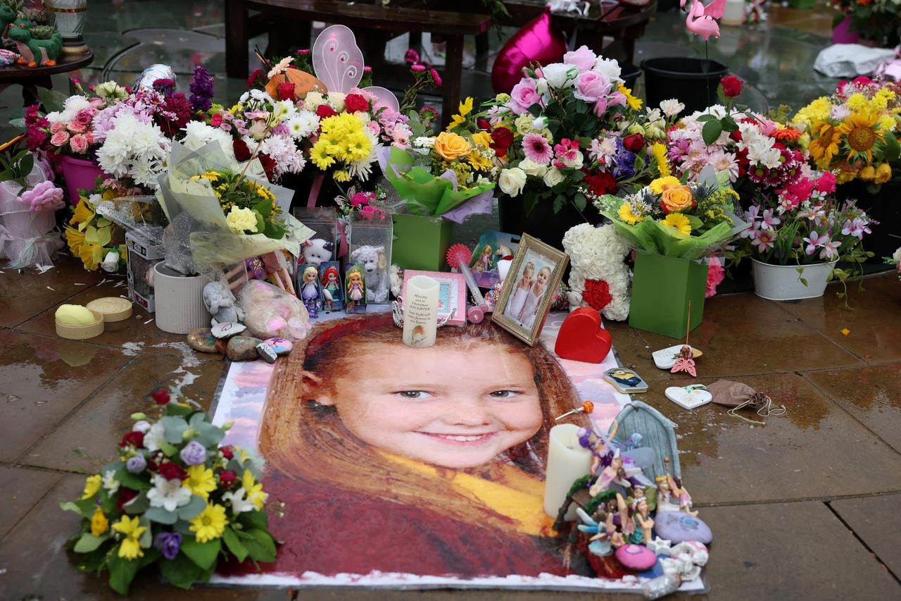 Floral tributes left by members of the public are seen following the fatal knife attack on three young girls in July in Southport