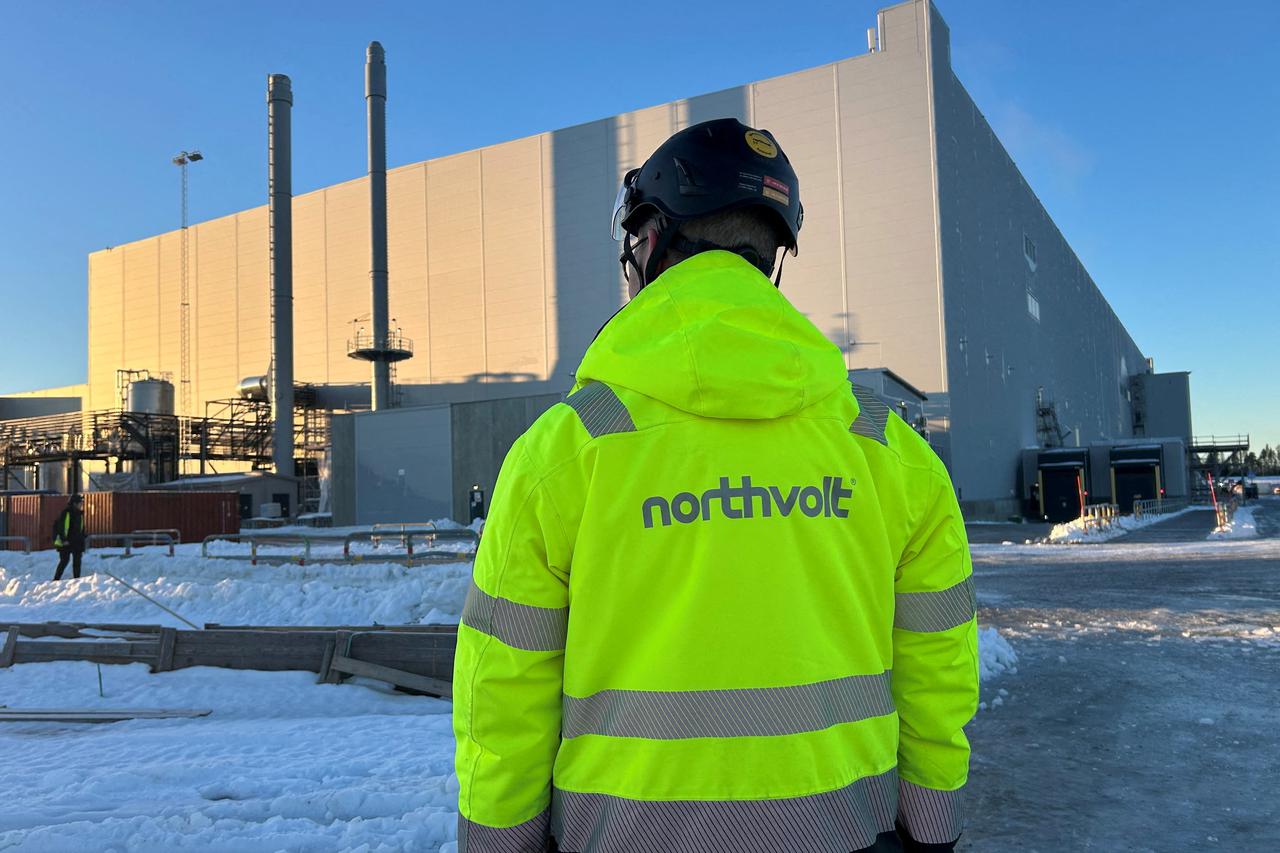 FILE PHOTO: A man stands in front of the Northvolt Ett factory in Skelleftea, Sweden