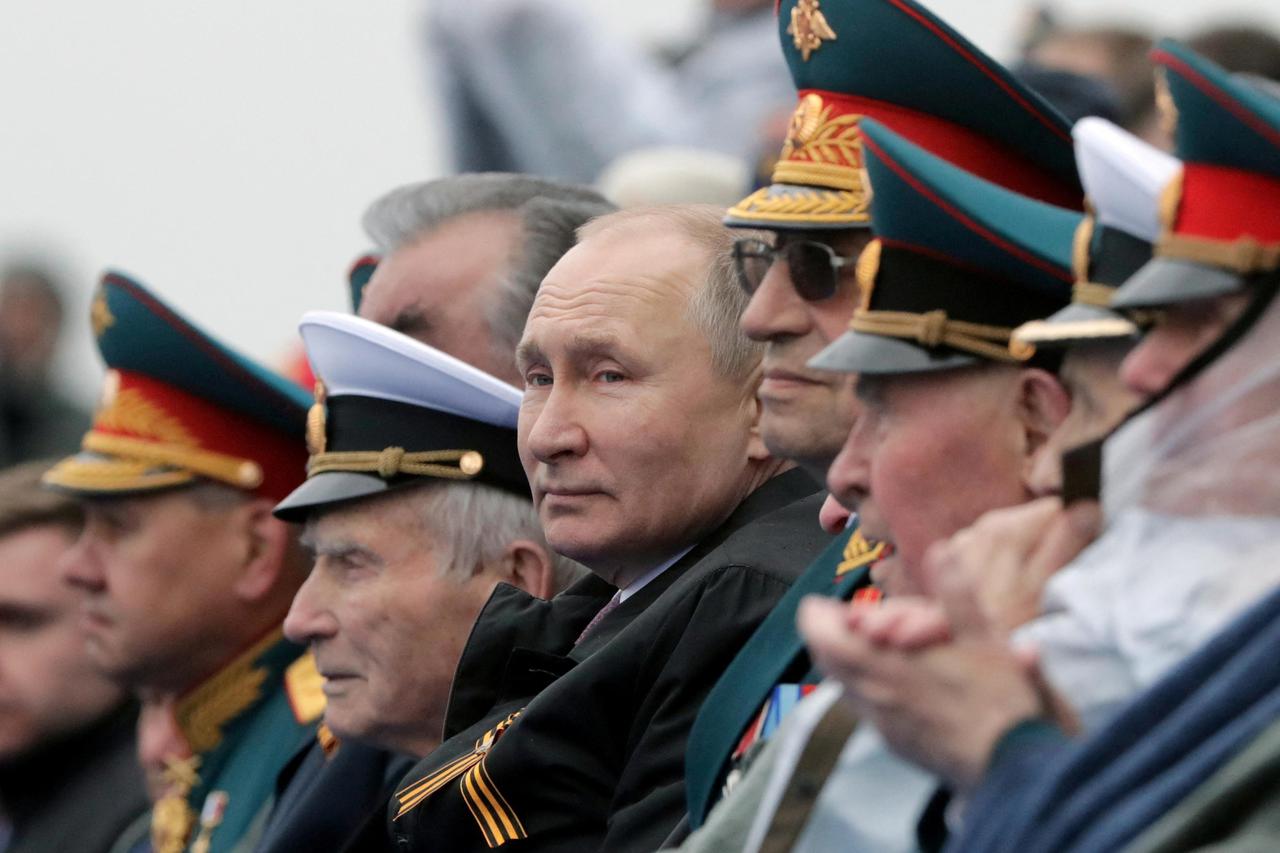 FILE PHOTO: Russian President Vladimir Putin attends a military parade on Victory Day, which marks the 76th anniversary of the victory over Nazi Germany in World War Two, in Red Square in central Moscow, Russia May 9, 2021