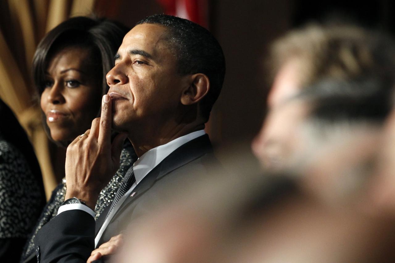 Umjesto cigarete, prsti na usnama - Barack Obama