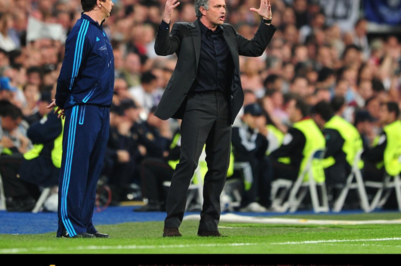 'Real Madrid coach Jose Mourinho (right) on the touchline Photo: Press Association/Pixsell'