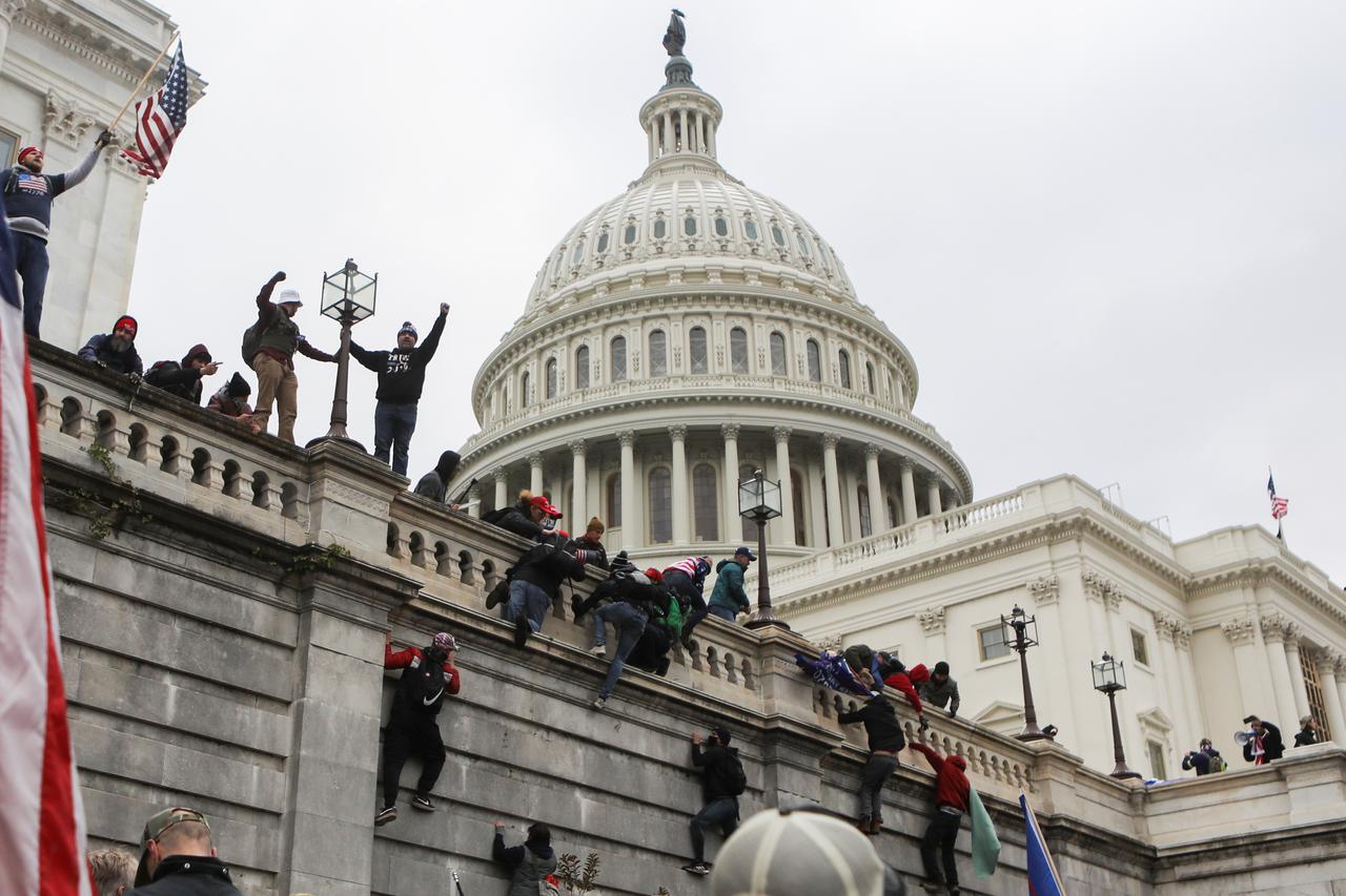 FILE PHOTO: Supporters of U.S. President Donald Trump gather in Washington