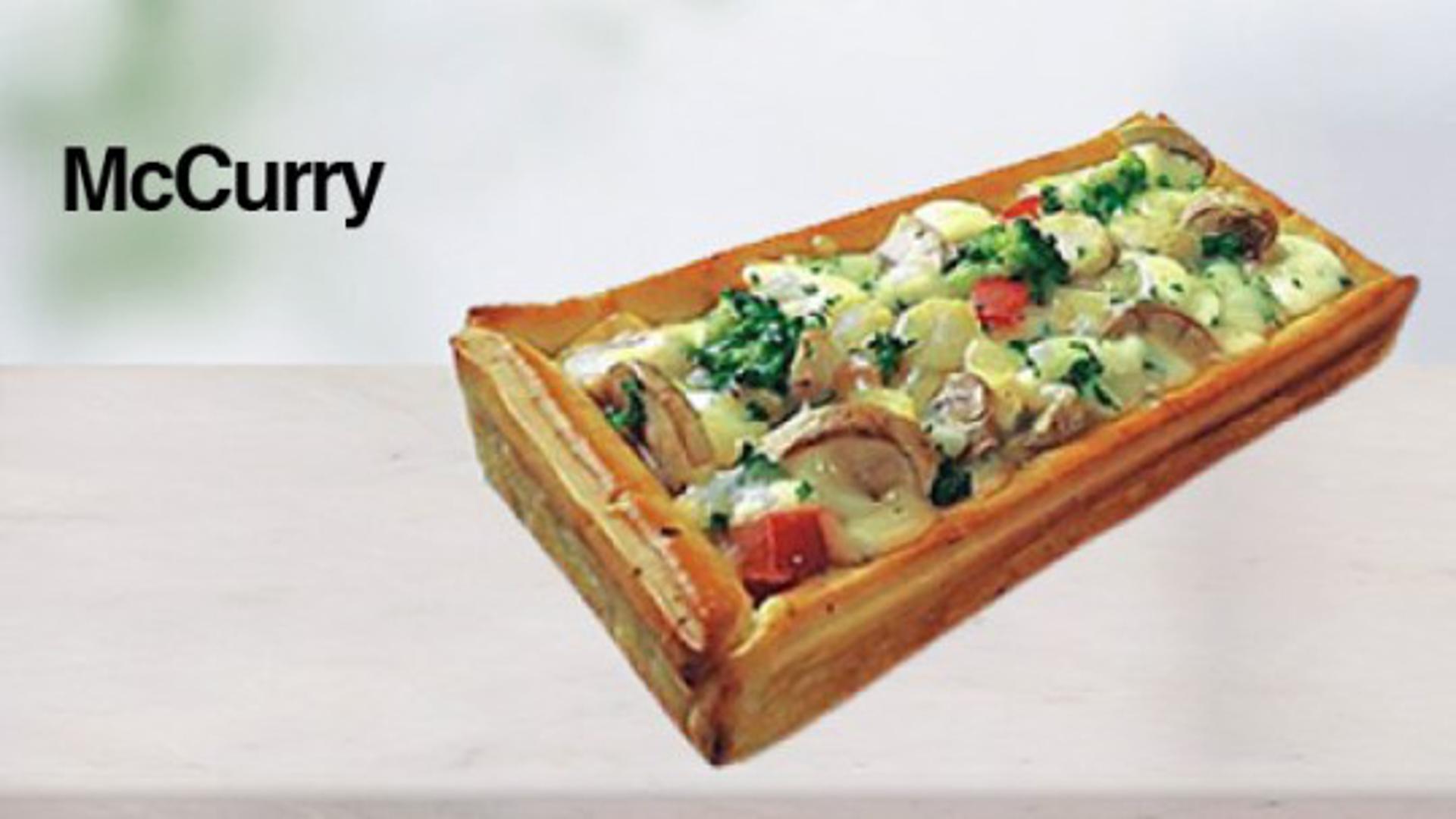 Indija poslužuje svoja tradicionalna jela - McCurry serviran u kruhu.
