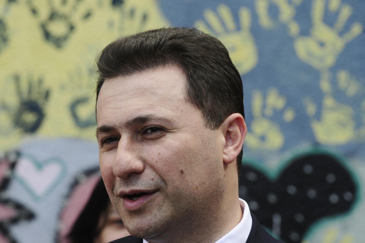 'Macedonian Prime Minister and leader of ruling party VMRO-DPMNE Nikola Gruevski addresses the media at a polling station in Skopje June 5, 2011. Macedonia voted on Sunday in a parliamentary election 