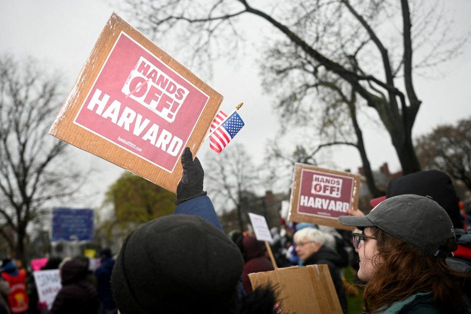 FILE PHOTO: Demonstrators rally on Cambridge Common in a protest organized by the City of Cambridge against interference by the federal government, in Cambridge