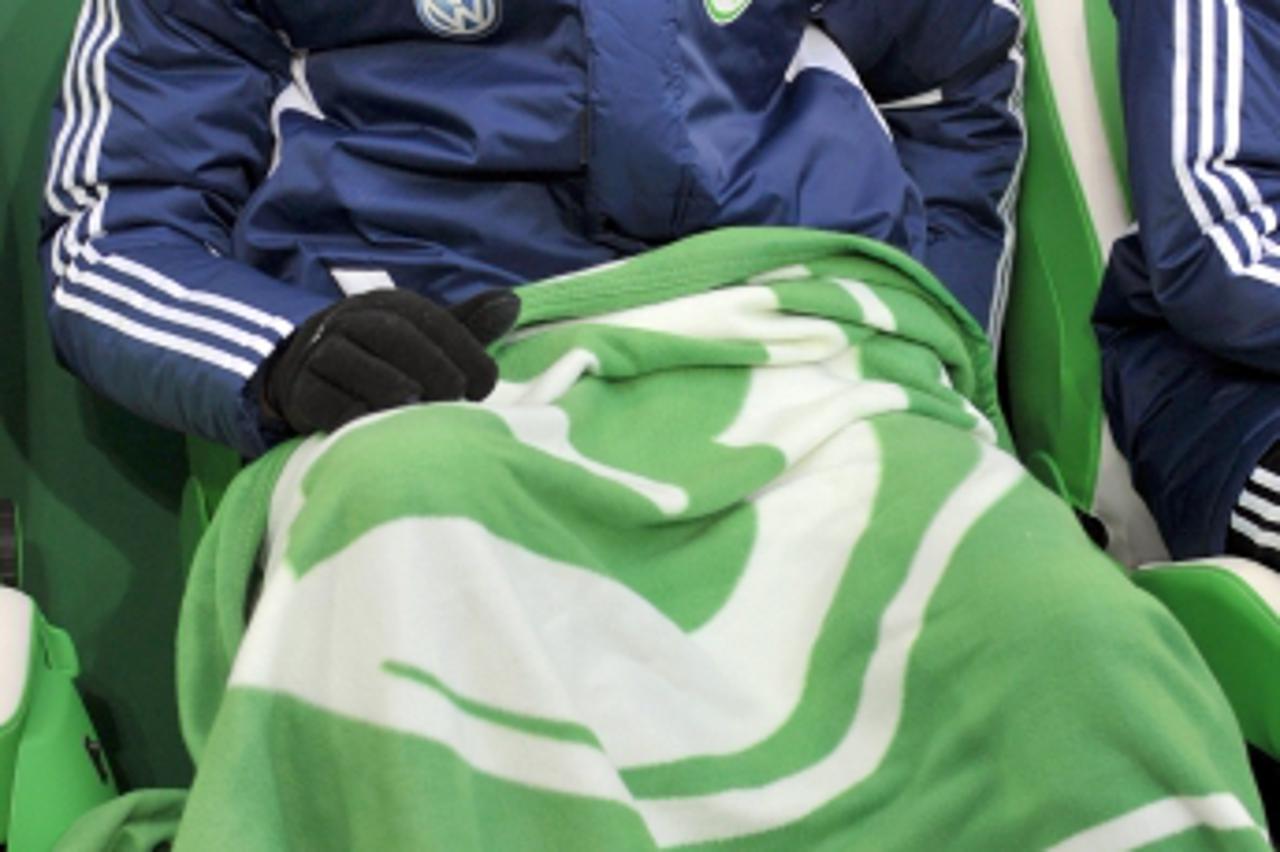 'Wolfsburg\'s Croatian striker Mario Mandzukic sits on the bench during the German first division Bundesliga football match Vfl Wolfsburg vs Borussia Moenchengladbach in Wolfsburg, western Germany, on