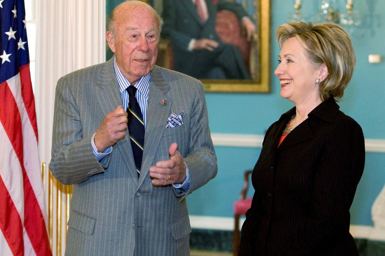FILE PHOTO: U.S. Secretary of State Hilary Clinton meets with former Secretary of State Shultz in Washington