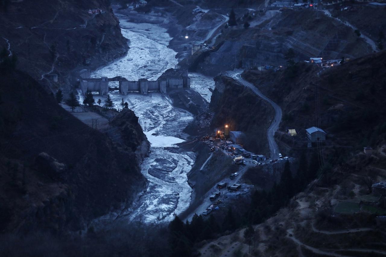 Rescue operation outside a tunnel after a part of a glacier broke away, in Tapovan