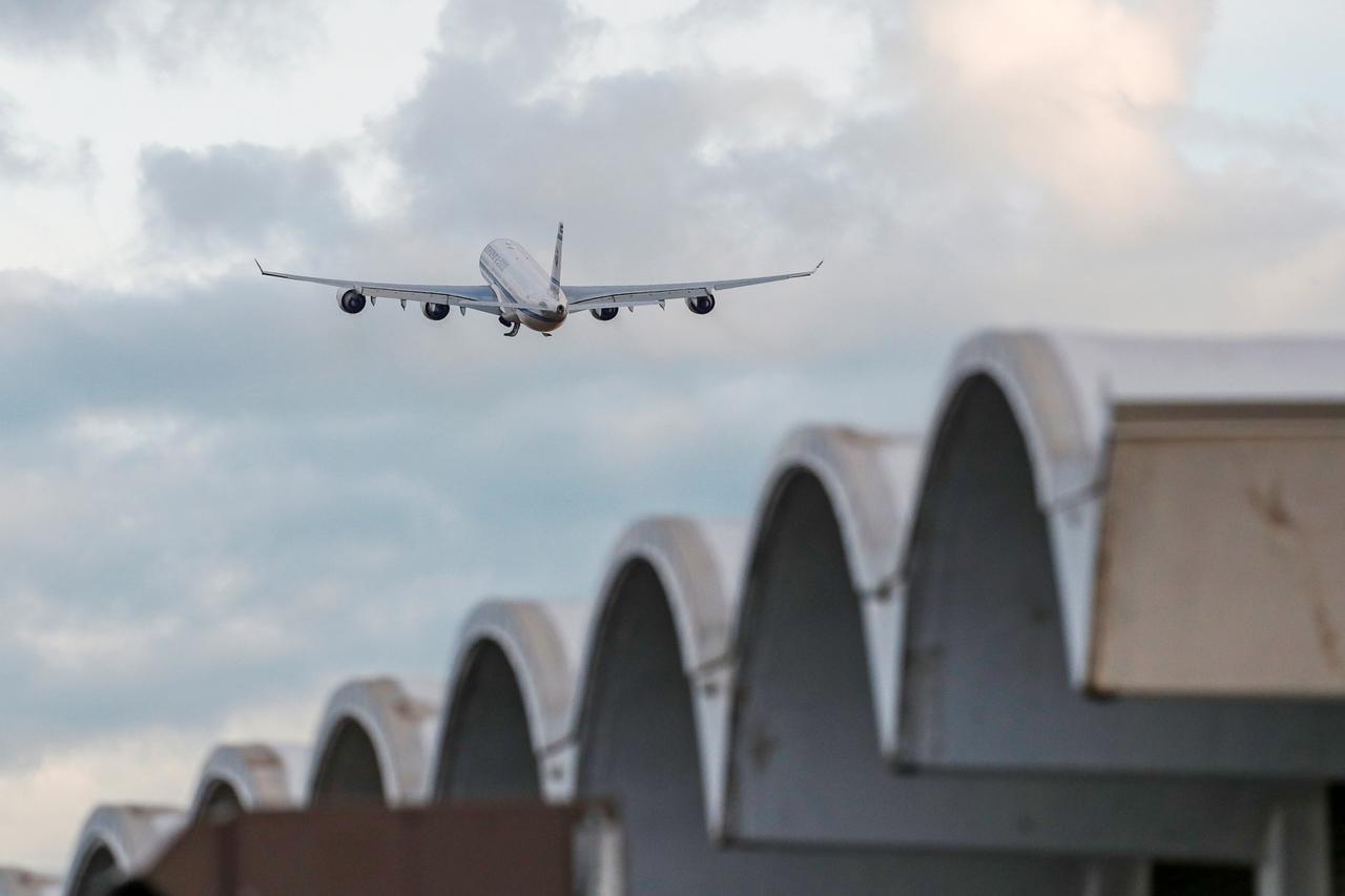 An Airbus A340 jet leaves the Rochester International Airport after Kuwait announced that ruling Emir Sheikh Sabah al-Ahmad al-Sabah had died