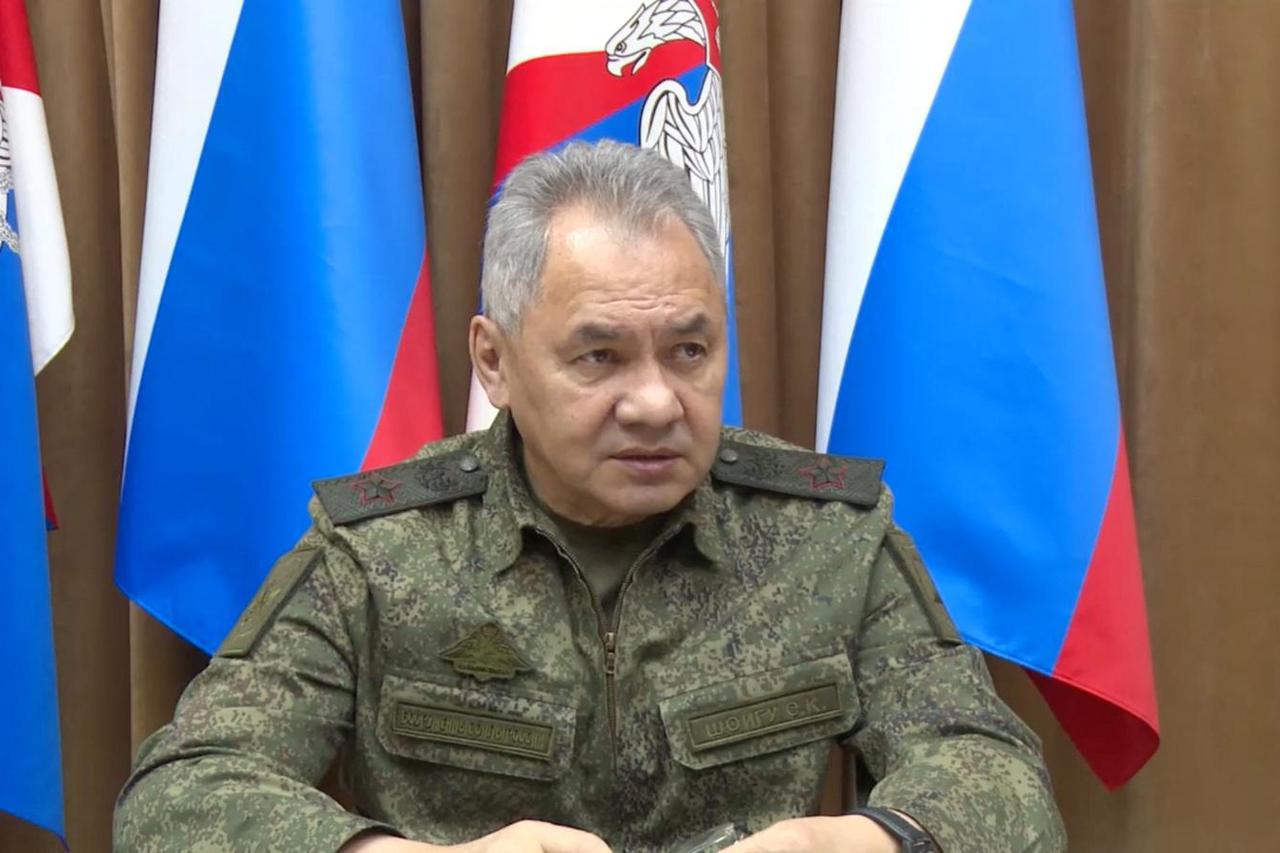 Russian Defence Minister Sergei Shoigu attends a meeting with officials of the Defence Ministry in an unknown location