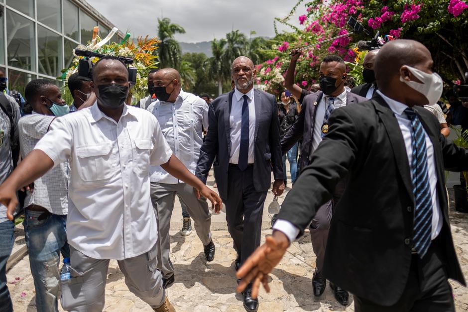 Haitian designated Prime Minister Ariel Henry arrives at a ceremony in the National Pantheon Museum in honor of late Haitian President Jovenel Moise, in Port-au-Prince