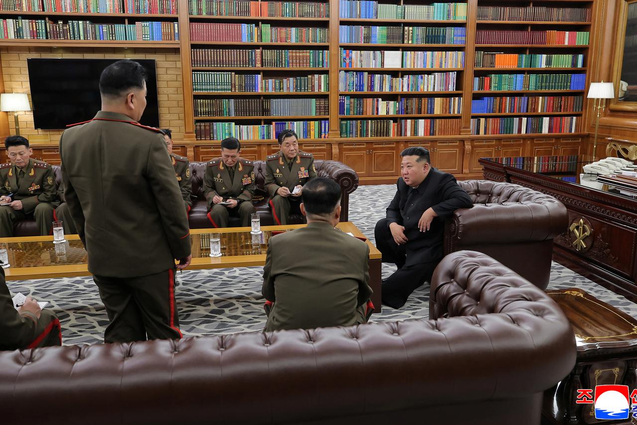 North Korean leader Kim Jong attends a meeting with officers of the army's overseas operation, in Pyongyang
