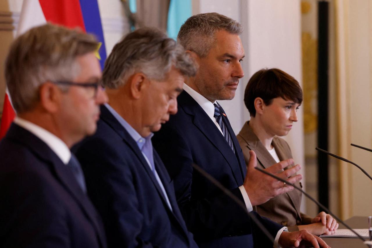 Austrian Chancellor Nehammer and Ministers attend a news conference in Vienna