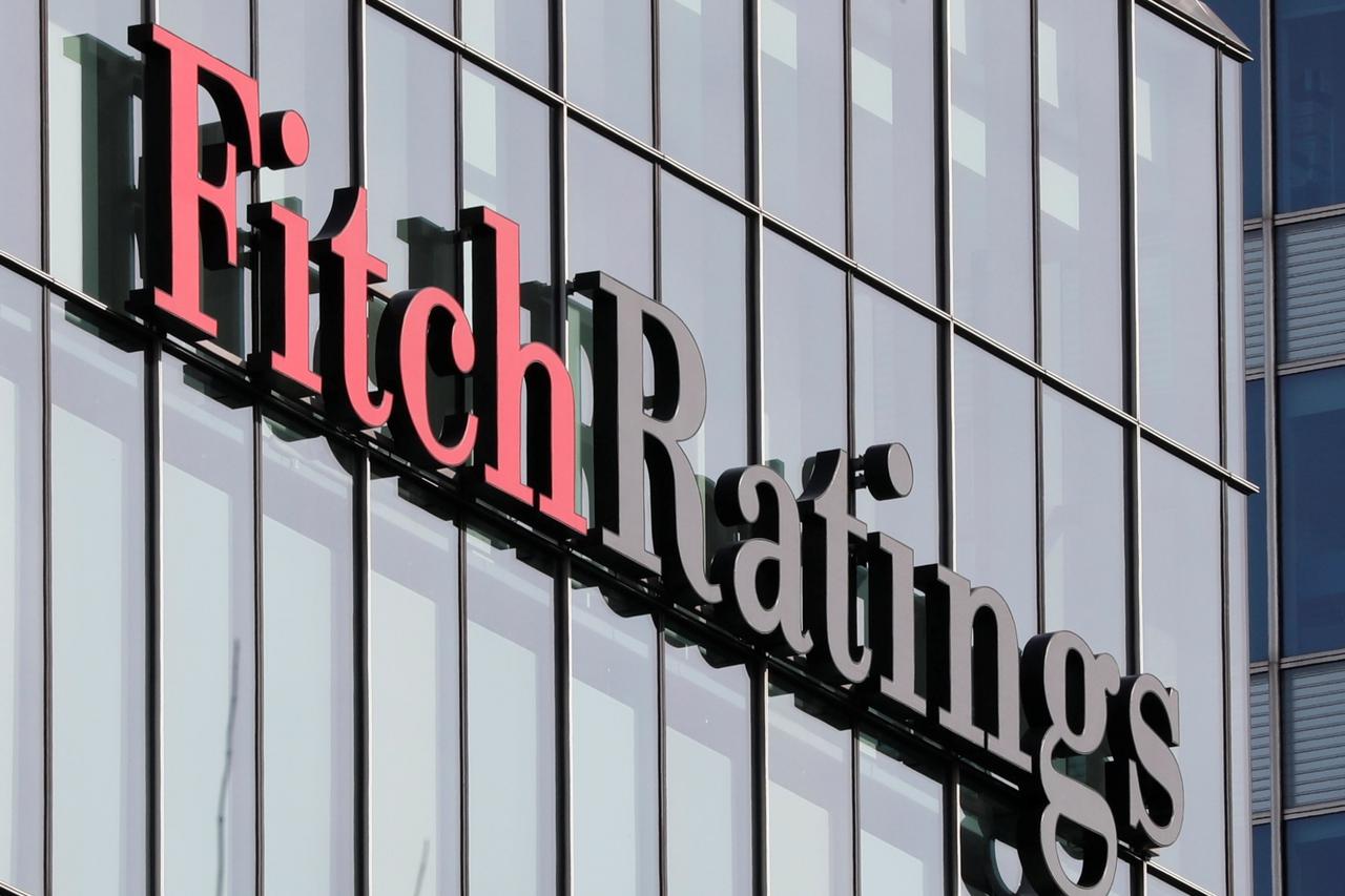 FILE PHOTO: The Fitch Ratings logo is seen at its offices at Canary Wharf financial district in London