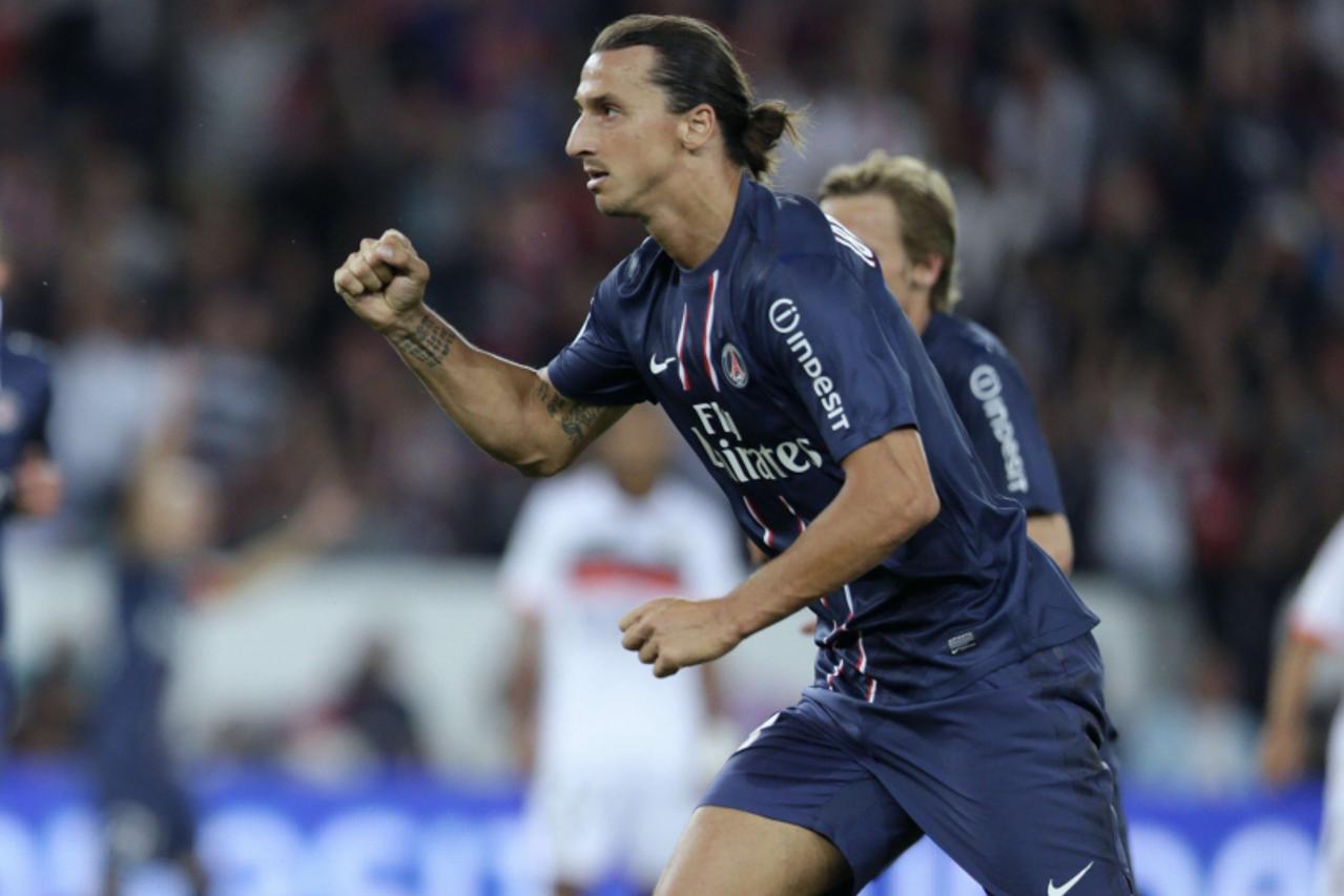 'Paris Saint-Germain\'s Swedish forward Zlatan Ibrahimovic celebrates after scoring a goal during the French L1 football match Paris (PSG) vs Lorient (FCL), on August 11, 2012 at the Parc des Princes 