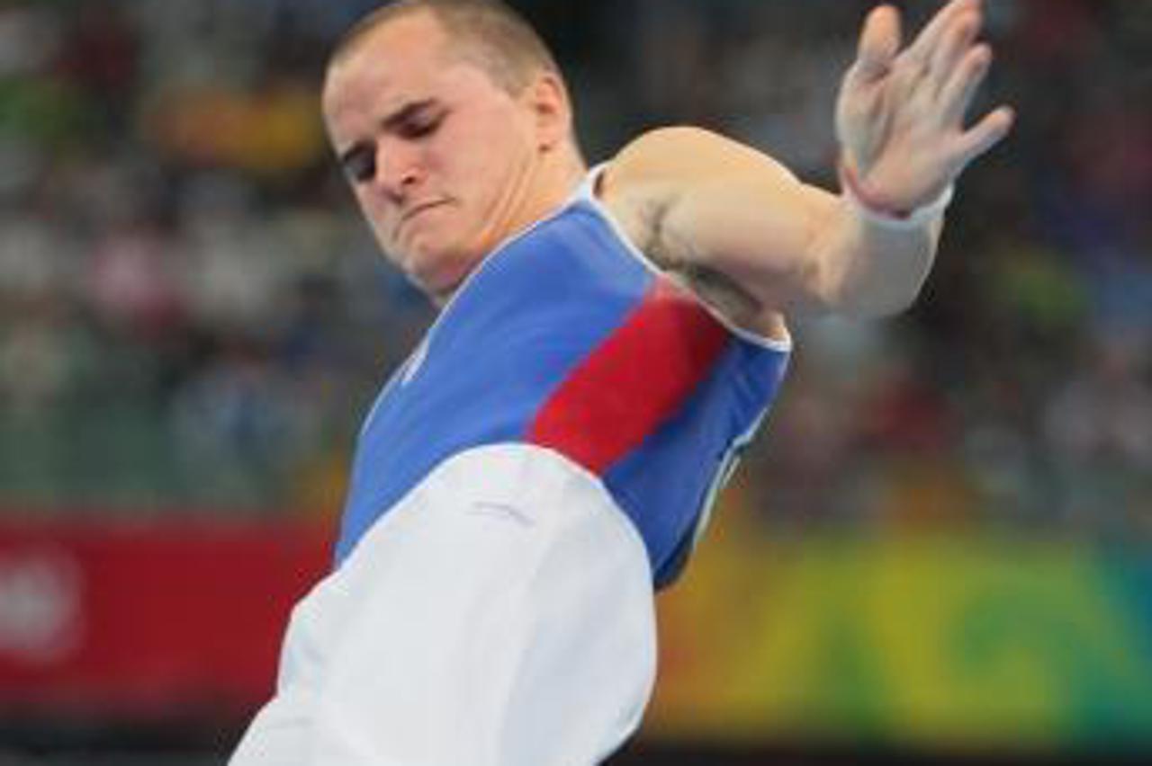 '17.08.2008, Peking, Kina - Olimpijske igre 2008.  Filip Ude osvojio je srebrnu medalju na konju s hvataljkama.   Photo: Zeljko Lukunic/PIXSELL'