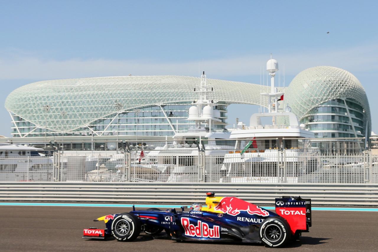 'Red Bull Racing\'s German driver Sebastian Vettel drives during the first practice session at the Yas Marina circuit on November 2, 2012 in Abu Dhabi ahead of the Abu Dhabi Formula One Grand Prix.   