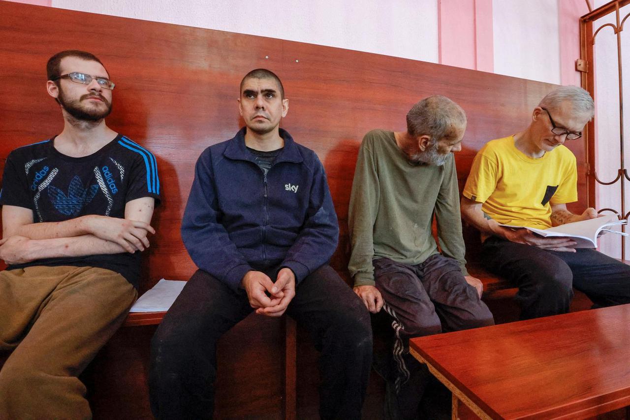 Foreign nationals captured during Ukraine-Russia conflict attend a court hearing in Donetsk