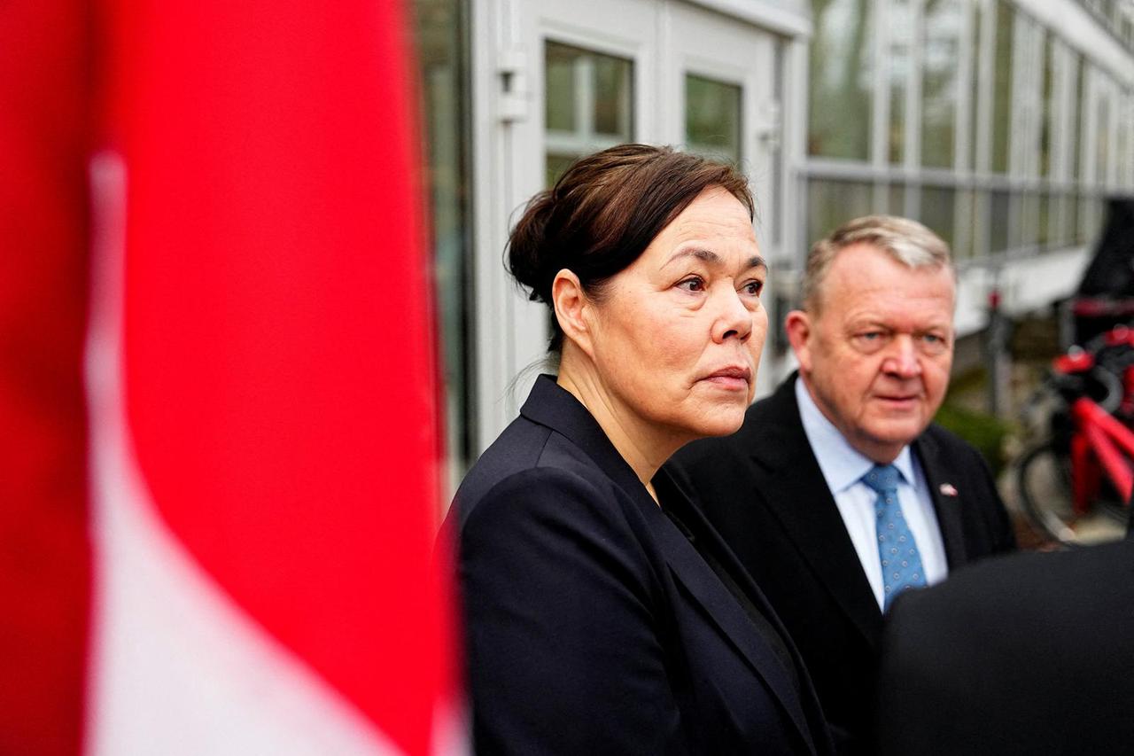 Denmark's Foreign Minister Lars Loekke Rasmussen and Greenland's Foreign Minister Vivian Motzfeldt prepare for meeting at the White House