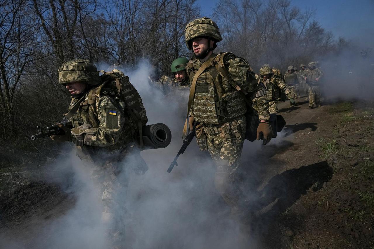 New recruits of the Ukrainian Armed Forces attend their first military training near a frontline in Zaporizhzhia region