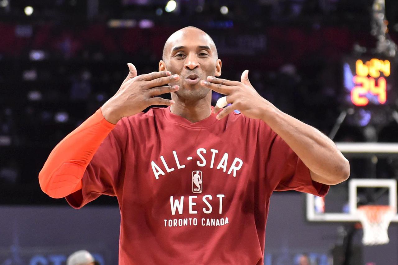 Feb 14, 2016; Toronto, Ontario, CAN; Western Conference forward Kobe Bryant of the Los Angeles Lakers (24) blows kisses before the NBA All Star Game at Air Canada Centre. Mandatory Credit: Bob Donnan-USA TODAY Sports      TPX IMAGES OF THE DAY       Pictu