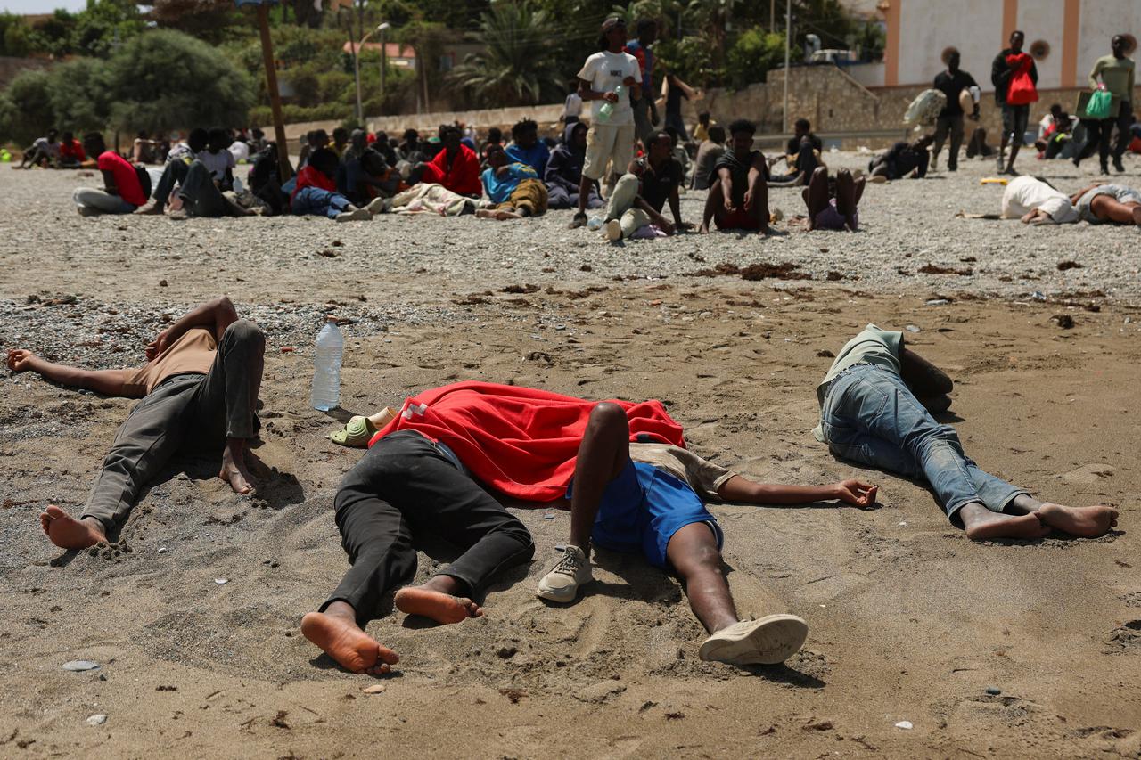 Mass crossings of migrants on foot and by sea from Morocco into Spanish territory, in Ceuta